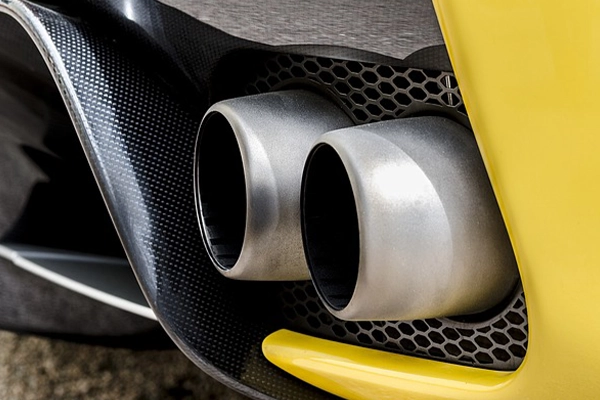 Close up of dual exhaust on yellow car