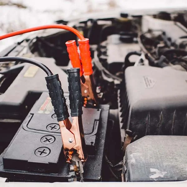 car battery and jumper cables
